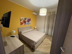 Posteľ alebo postele v izbe v ubytovaní Casa Vacanza Giardini Naxos Sarahouse