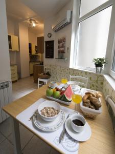 Možnosti snídaně pro hosty v ubytování Main Square Apartment