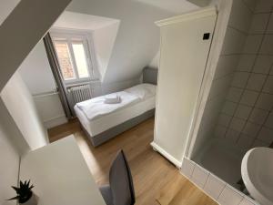Postel nebo postele na pokoji v ubytování Swan Rooms