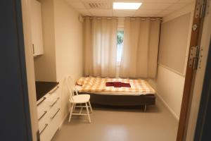 Postel nebo postele na pokoji v ubytování Skrå hostel - bed & business