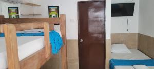 Postel nebo postele na pokoji v ubytování posada barrios mar
