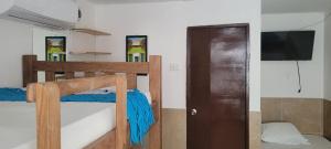 Postel nebo postele na pokoji v ubytování posada barrios mar