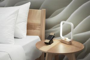 Ліжко або ліжка в номері Hotel Ruby Foo's