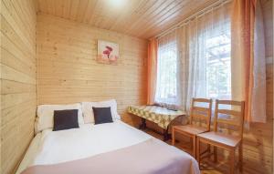 Ένα ή περισσότερα κρεβάτια σε δωμάτιο στο Lovely Apartment In Pogorzelica