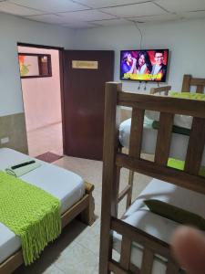 Postel nebo postele na pokoji v ubytování posada barrios mar