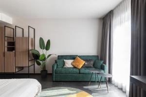 Predel za sedenje v nastanitvi Ariane Hotel