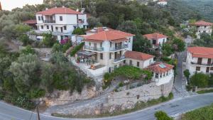 an aerial view of a house on a hill at Horto View Suites in Chorto