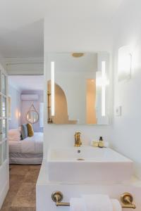 Postel nebo postele na pokoji v ubytování The Pearl - Marbella