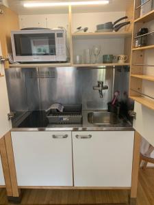 Η κουζίνα ή μικρή κουζίνα στο The Cottage Hankerton Priory +14 φωτογραφίες