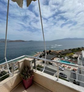 a view of the ocean from the balcony of a hotel at Port Side Sarande in Sarandë