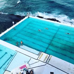 an overhead view of a swimming pool on the ocean at EIGHT TWO NINE TWO VI: BONDI BEACH in Sydney
