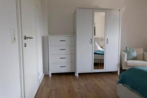 Postel nebo postele na pokoji v ubytování Ferienwohnungen BergArt
