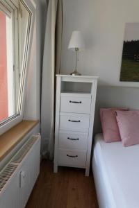 Postel nebo postele na pokoji v ubytování Ferienwohnungen BergArt