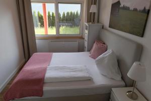 Postel nebo postele na pokoji v ubytování Ferienwohnungen BergArt