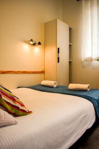 Posteľ alebo postele v izbe v ubytovaní Arcus Premium Hostel