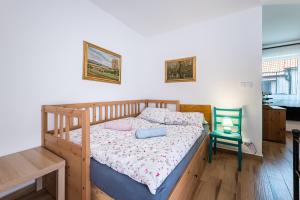 Postel nebo postele na pokoji v ubytování Škorničkův statek