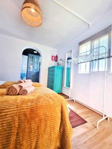 Ένα ή περισσότερα κρεβάτια σε δωμάτιο στο Casita La biznaga +9 φωτογραφίες
