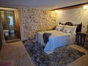 Cama ou camas em um quarto em Casarão do Largo da Eira