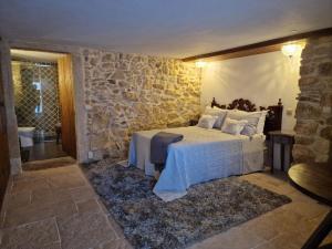 Cama ou camas em um quarto em Casarão do Largo da Eira