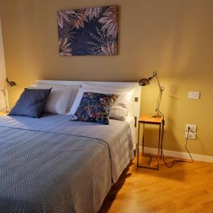 Ένα ή περισσότερα κρεβάτια σε δωμάτιο στο L' Approdo12