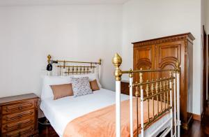 Postel nebo postele na pokoji v ubytování A ver o mar rooms- Funchal city center