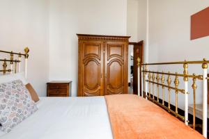 Postel nebo postele na pokoji v ubytování A ver o mar rooms- Funchal city center