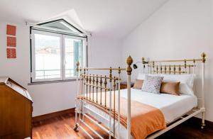 Postel nebo postele na pokoji v ubytování A ver o mar rooms- Funchal city center
