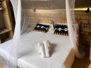 Katil atau katil-katil dalam bilik di Glamping Tuscany - Podere Cortesi