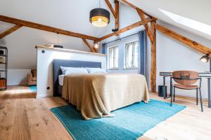 Postel nebo postele na pokoji v ubytování Landwarenhaus Gross Beuchow + 12 fotografií