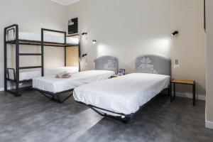 Katil atau katil-katil dalam bilik di Piccolo Catalunya Hostel