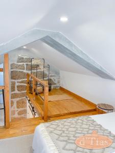 Postel nebo postele na pokoji v ubytování Casa das Tias