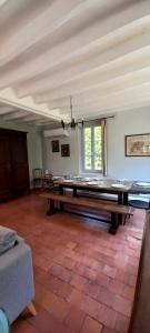 a large room with a ping pong table in it at Gîte-Région centre-Sologne 41 proche Lamotte Beuvron in Nouan-le-Fuzelier +4 photos