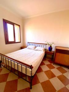 Ένα ή περισσότερα κρεβάτια σε δωμάτιο στο Small villa in the souiria beach