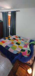En eller flere senge i et værelse på palo santo