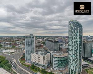 an aerial view of a city with tall buildings at The Lexington - Luxury Serviced Apartments City Centre - City and Waterfront views in Liverpool
