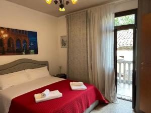 Postel nebo postele na pokoji v ubytování Venice Guest House