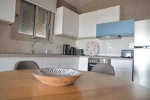 Kuchyň nebo kuchyňský kout v ubytování Cocoon Elegant Living