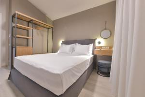 Postel nebo postele na pokoji v ubytování Cocoon Elegant Living + 13 fotografií