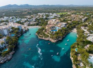 an aerial view of a river in a city at MarSenses Natura Olea Hotel in Cala d´Or