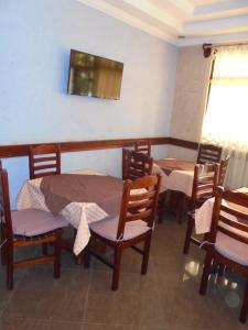 TV a/nebo společenská místnost v ubytování Hotel Marvin