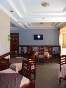 TV a/nebo společenská místnost v ubytování Hotel Marvin