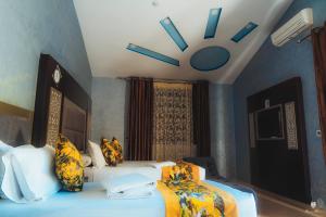 Ένα ή περισσότερα κρεβάτια σε δωμάτιο στο Hotel Jibal Chaouen