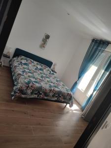 Postel nebo postele na pokoji v ubytování L’oasis mezoise