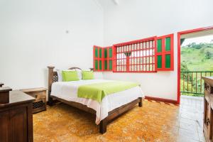 Кровать или кровати в номере Primavera Ecoalbergue