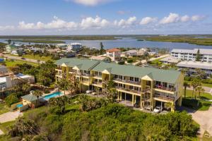 an aerial view of a resort with a body of water at Ocean Club At Turtlemound 107 - 2 Bedroom 1 Bath in New Smyrna Beach