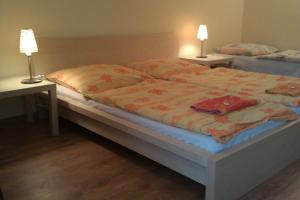 Postel nebo postele na pokoji v ubytování Hotel Jeleň