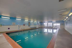 a large swimming pool in a building at Prime Coastal Retreat on Lincoln City Beach! in Lincoln City