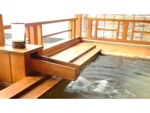 Postel nebo postele na pokoji v ubytování Yumura Onsen Tomiya - Vacation STAY 81696v