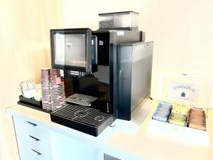 a counter with a microwave and a laptop on it at EN HOTEL Ise - Vacation STAY 89611v in Ise