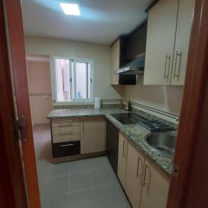 O bucătărie sau chicinetă la Apartamento acogedor Córdoba